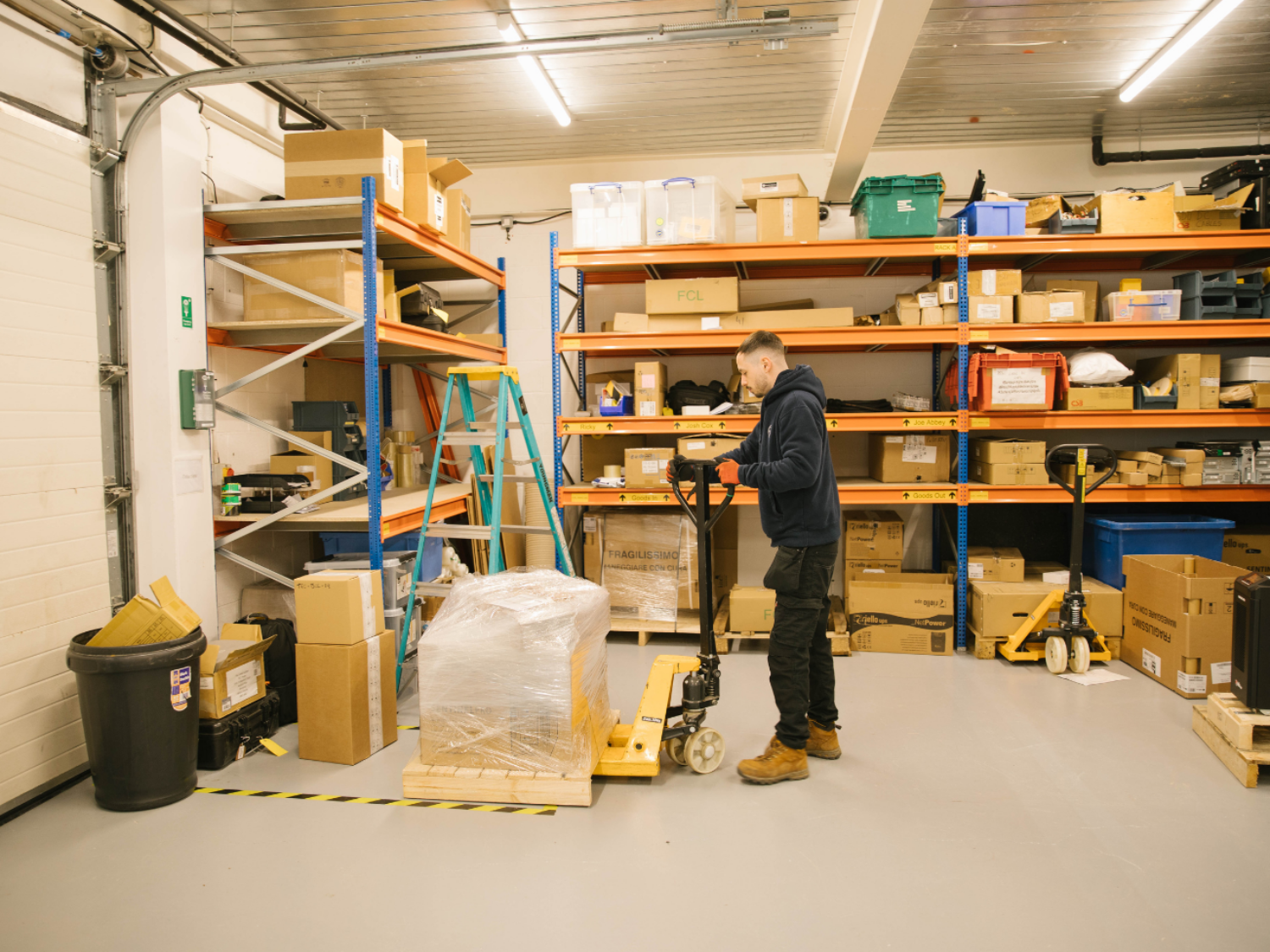 Man lifting heavy equipment